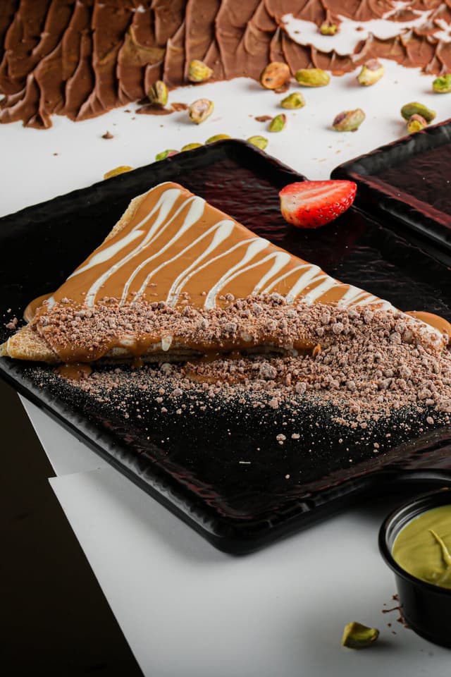 A Papa Chocolate crepe finished with fresh berries